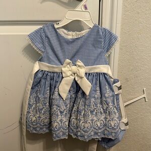 Rare edition collection dress! Size 6/9 months. Never worn.